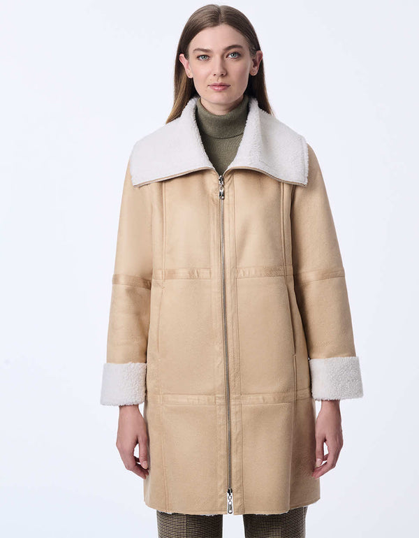 womens teddy and faux leather reversable coat. Cozy effortless style with a two-in-one design.