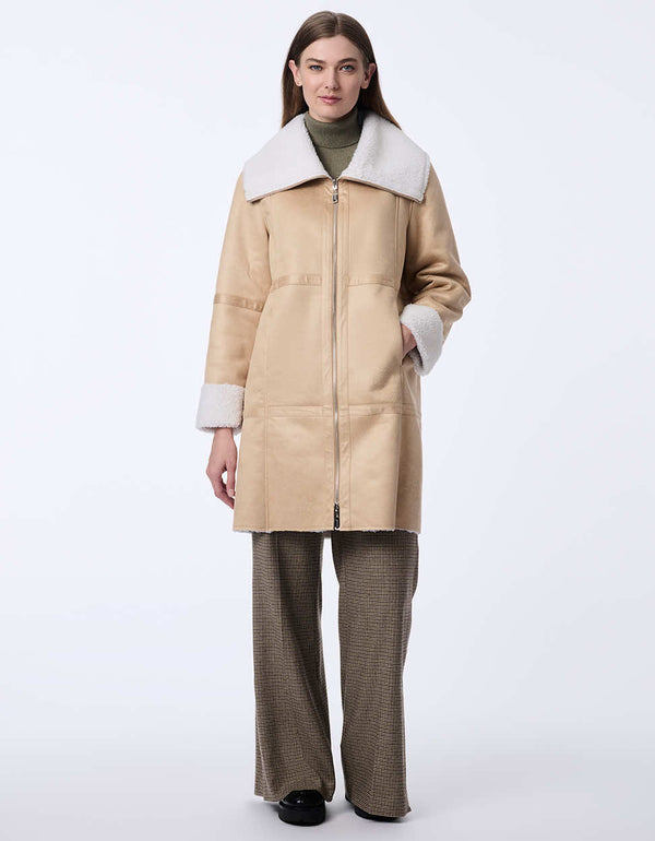 womens teddy and faux leather reversable coat. Cozy effortless style with a two-in-one design.