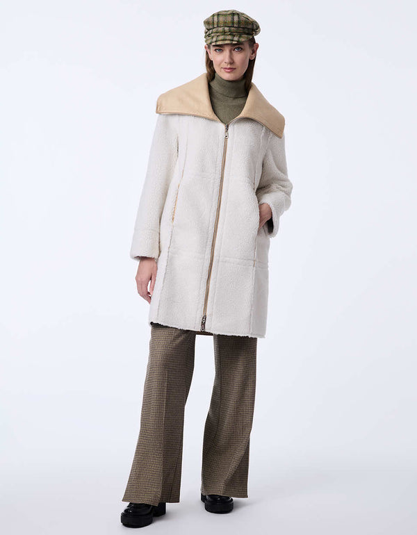 womens teddy and faux leather reversable coat. Cozy effortless style with a two-in-one design.