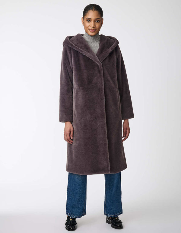 statement womens faux fur coat featuring a chic oversized design and a cozy hood for added flair