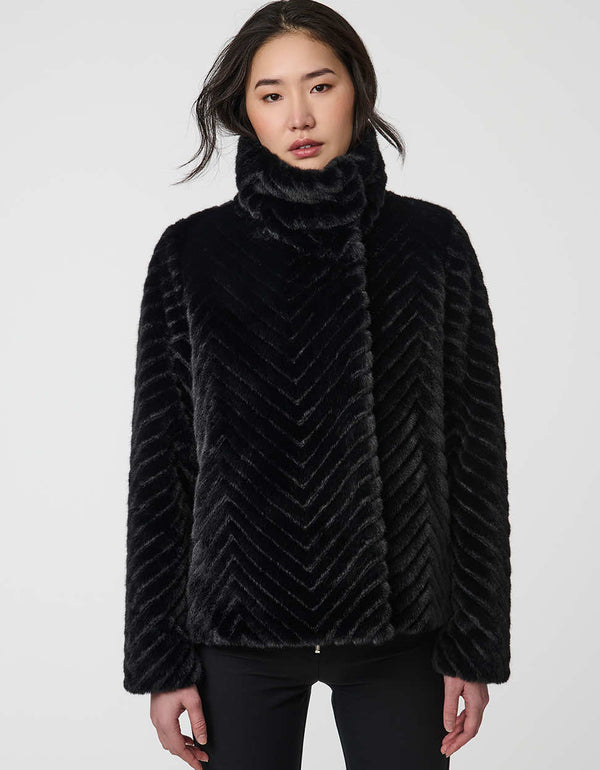 faux fur coat with dramatic collar and wide sleeves combining warmth and stylish flair