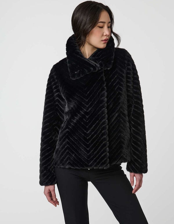 faux fur coat with dramatic collar and wide sleeves combining warmth and stylish flair
