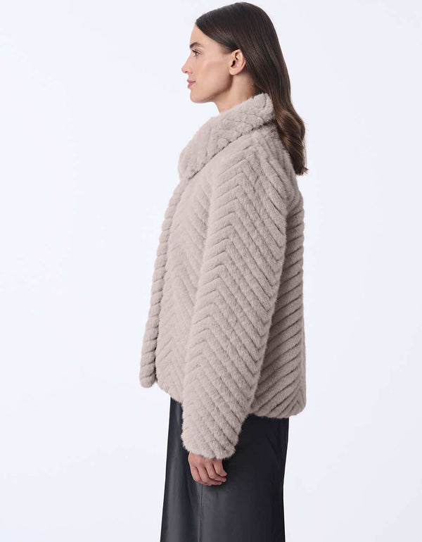 womens grey faux fur coat with classic fit oversized collar and wide sleeves for a dramatic stylish look