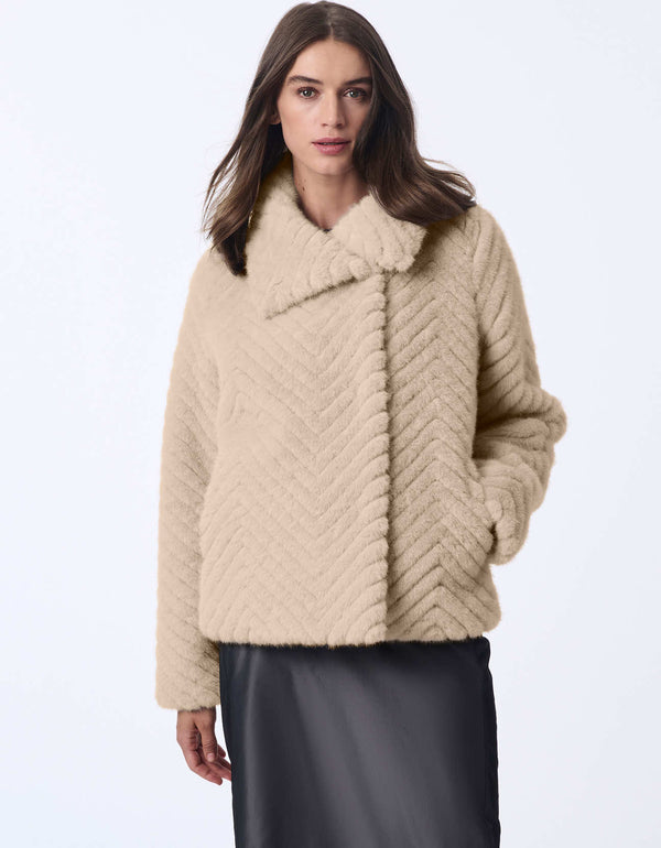 cozy oatmeal faux fur jacket featuring an oversized collar and spacious sleeves for a luxurious look