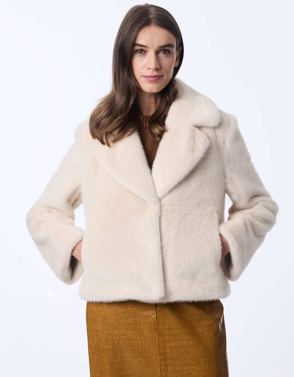 womens white luxe faux fur coat with a classic fit perfect for pairing with jeans or casual dresses