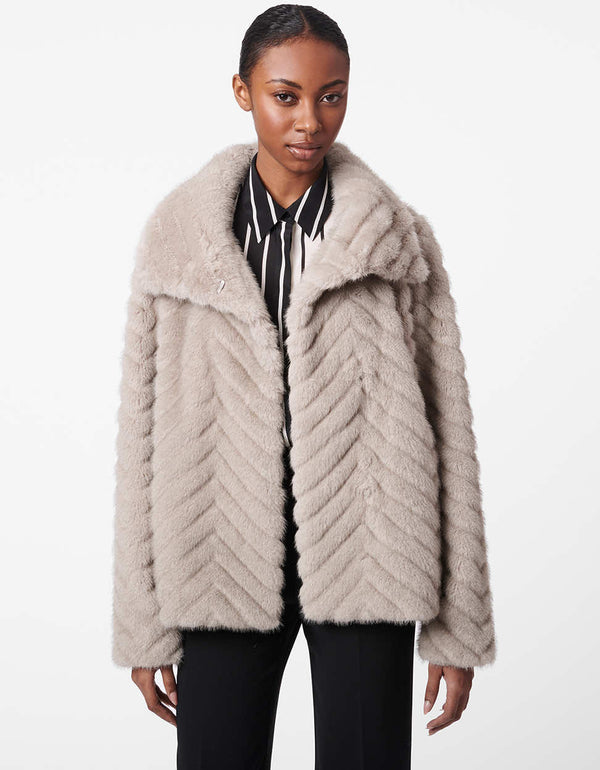 oversized fur jacket in light grey with wide collar and sleeves made from animal friendly fabric for women