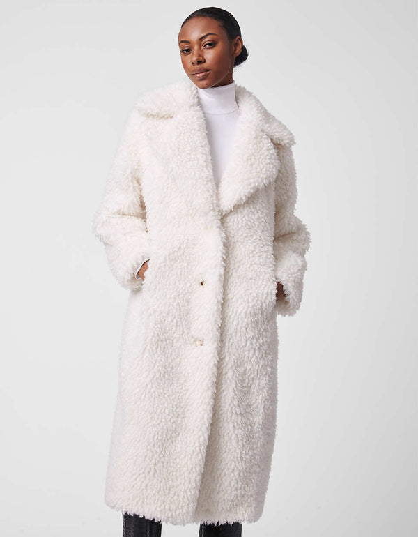 clean white faux fur coat for women with an oversized fit and wide open collar with two buttons