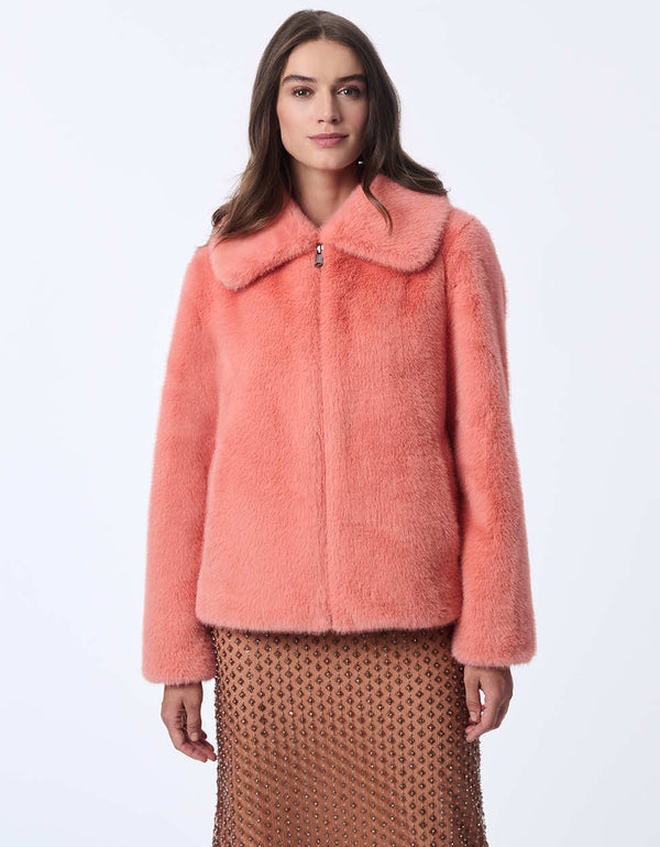 womens Faux Fur Jacket  with a collar and zip closure combines luxury with modern style.