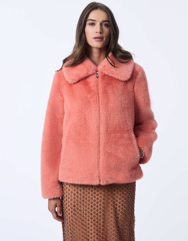 womens Faux Fur Jacket  with a collar and zip closure combines luxury with modern style.