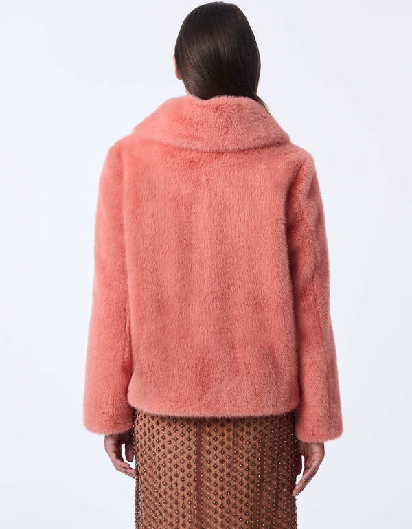 cozy faux fur jacket with a zip front and tailored fit perfect for a chic winter wardrobe