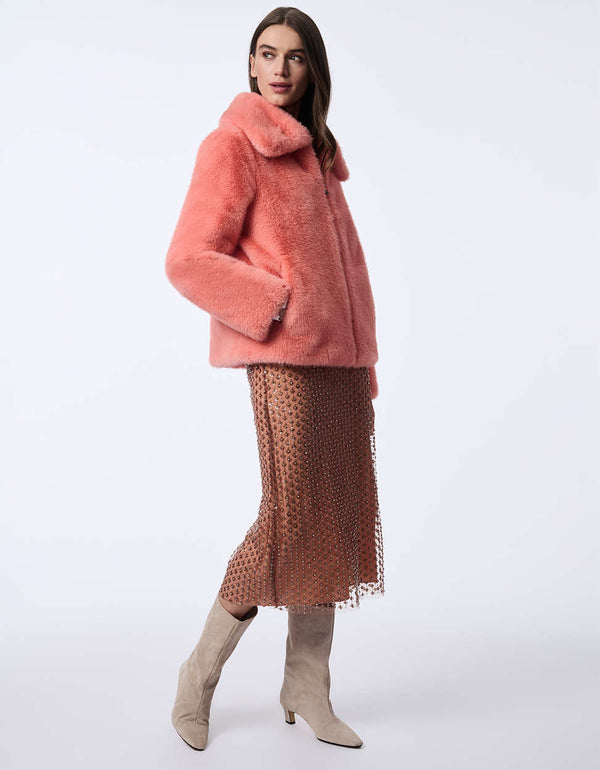 plush faux fur jacket with a relaxed fit and zip up design offering both warmth and sophistication