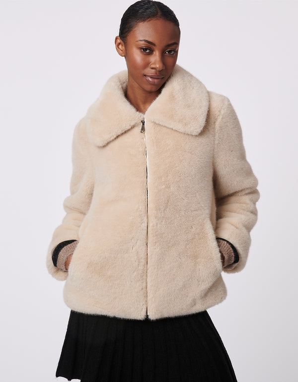 faux fur zip up jacket in oatmeal with a classic fit tailored for comfort and feminine glam