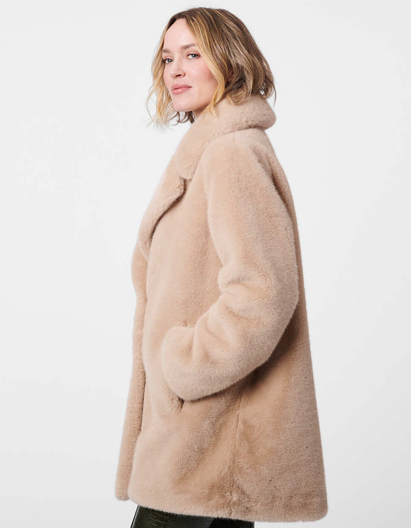 two pocket beige colored soft texture faux fur coat for women made with animal friendly fabrics