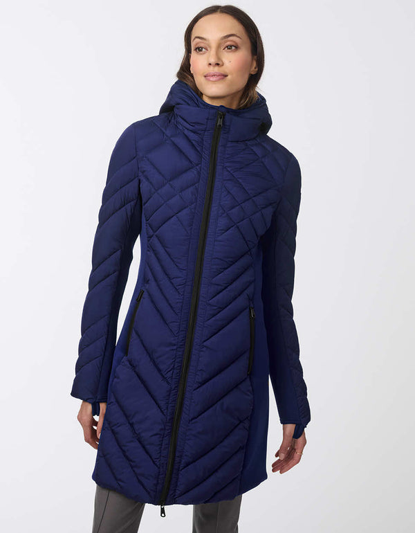 navy womens puffer walker with a mid length design removable hood and surprisingly light sustainable filler