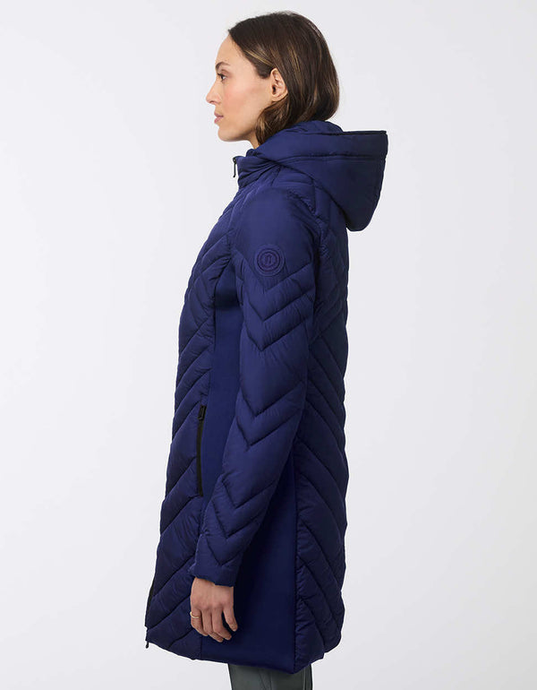 navy womens puffer walker with a mid length design removable hood and surprisingly light sustainable filler