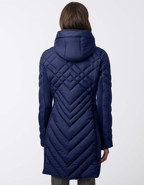 navy womens puffer walker with a mid length design removable hood and surprisingly light sustainable filler