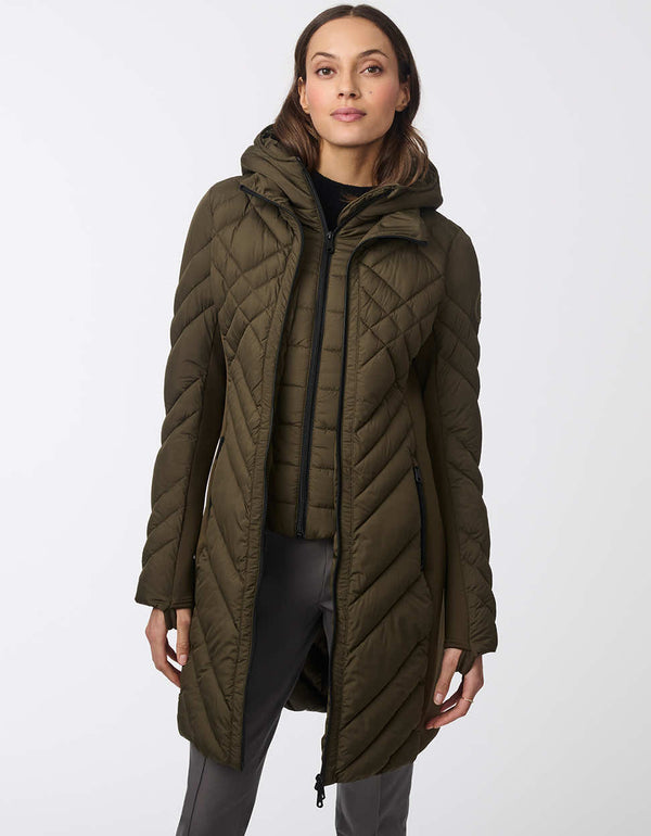 womens puffer walker with a mid length design removable hood and surprisingly light sustainable filler