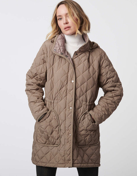 taupe cream quilted hip length puffer jacket with a zip up enclosure and button up zip cover for women