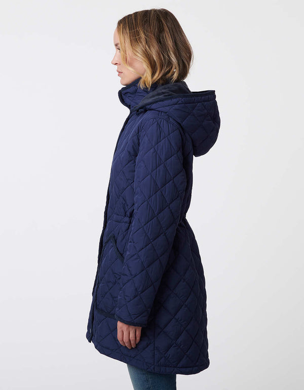 quilted zip up enclosure puffer jacket for women with buttoned zippers and buttoned zip cover