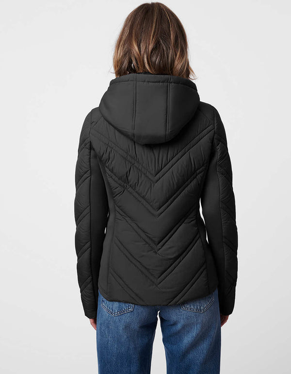 black puffer jacket with double stitched hood and double layered insulation for women on the go