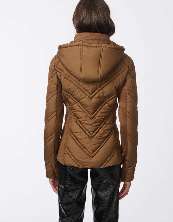 womens Puffer Jacket offers lightweight warmth and sporty style with recycled fill.