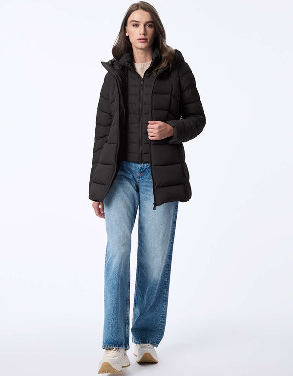 womens puffer coat with water-resistant fabric and removable bib. Features a cozy hood, modern stitching, and recycled insulation. Designed for extra warmth and sleek winter style.