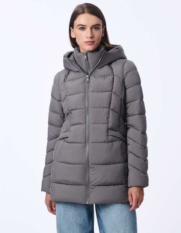 womens puffer coat with water-resistant fabric and removable bib. Features a cozy hood, modern stitching, and recycled insulation. Designed for extra warmth and sleek winter style.