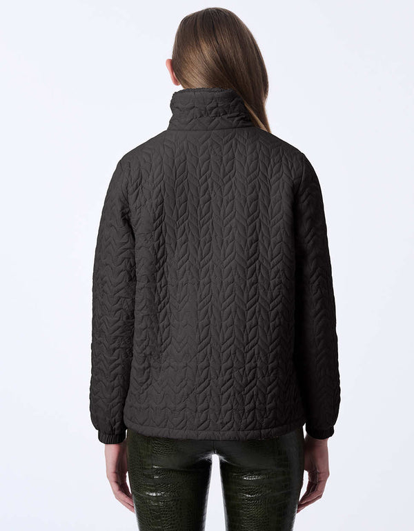 women's quilted jacket with teddy lining. A go-to style for comfort and layering.