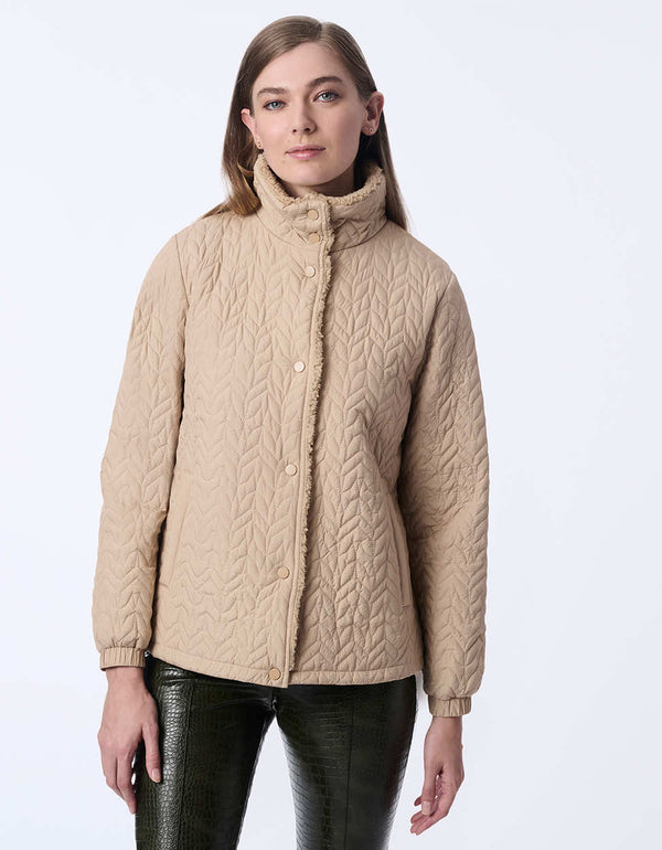 women's quilted jacket with teddy lining. A go-to style for comfort and layering.