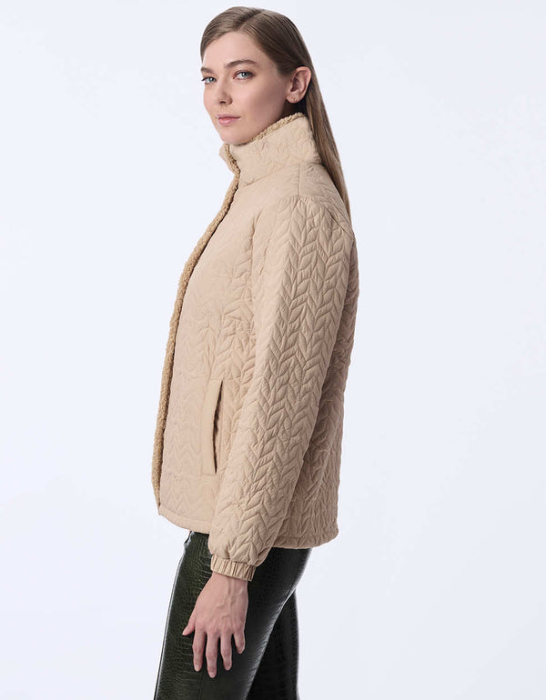 women's quilted jacket with teddy lining. A go-to style for comfort and layering.