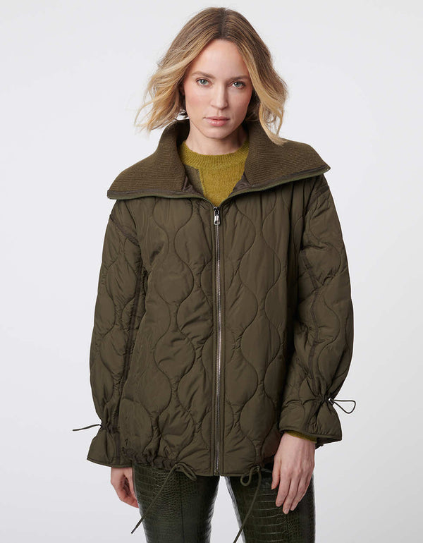 olive green colored quilted jacket with an oversized ribbed collar and full zip up enclosure