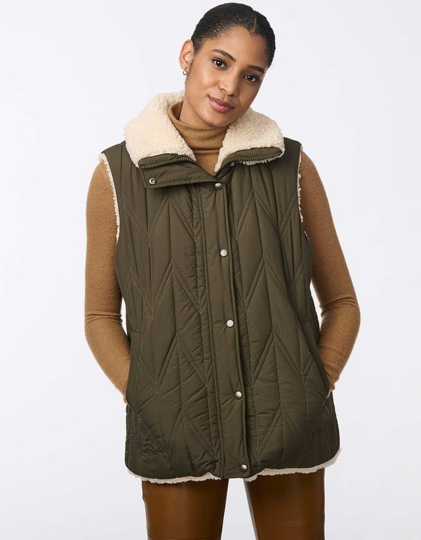 olive green reversible quilted vest for women with a plush sherpa lined side perfect as a warm layering piece