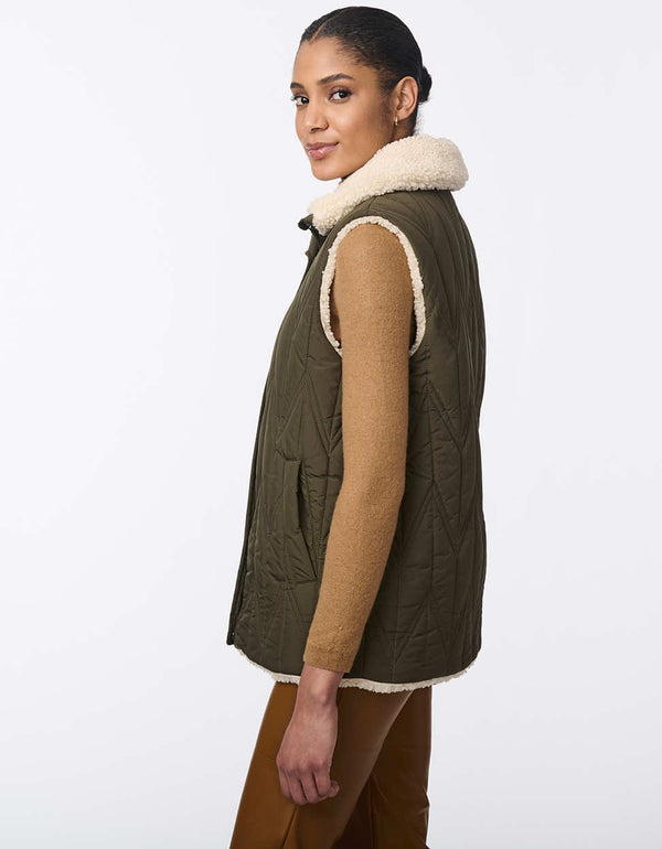 stylish olive green reversible vest for women with a quilted side and a cozy sherpa lined side for any occasion