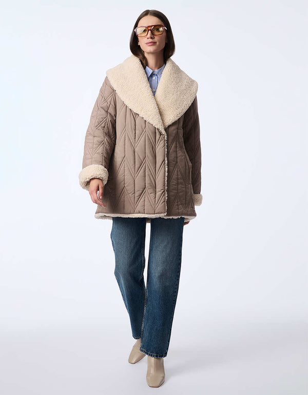 women's quilted teddy coat with large lapels. A cozy coat made with recycled materials to stay warm and cozy.