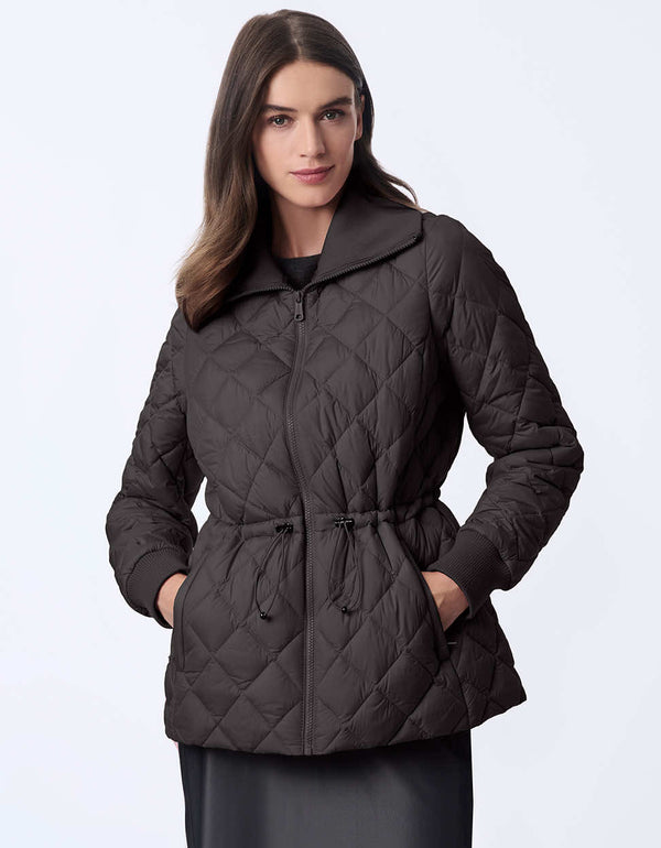 Women's quilted jacket with classic fit, hip-length design, and drawstring waist. Cinched wait for a chic silhouette