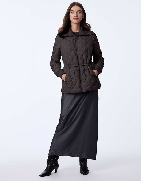 Women's quilted jacket with classic fit, hip-length design, and drawstring waist. Cinched wait for a chic silhouette