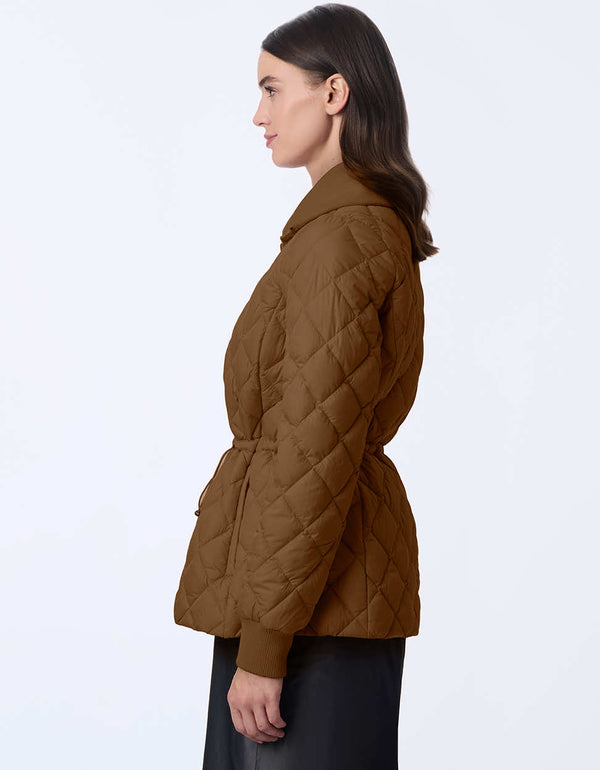 Women's quilted jacket with classic fit, hip-length design, and drawstring waist. Cinched wait for a chic silhouette