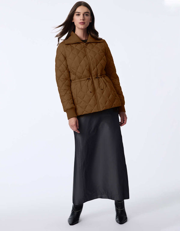 Women's quilted jacket with classic fit, hip-length design, and drawstring waist. Cinched wait for a chic silhouette