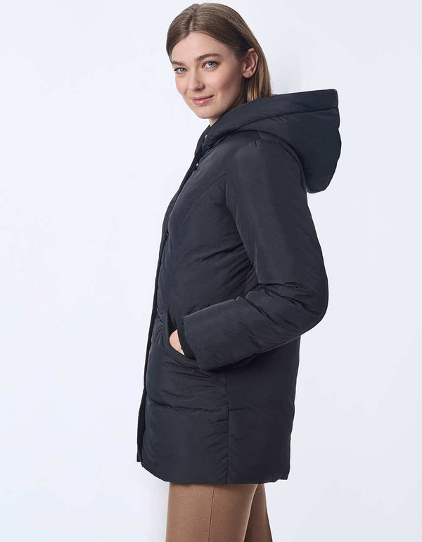 womens lightweight puffer coat with oversized hood. Made with recycled materials, this style keeps you cozy and fashionable.