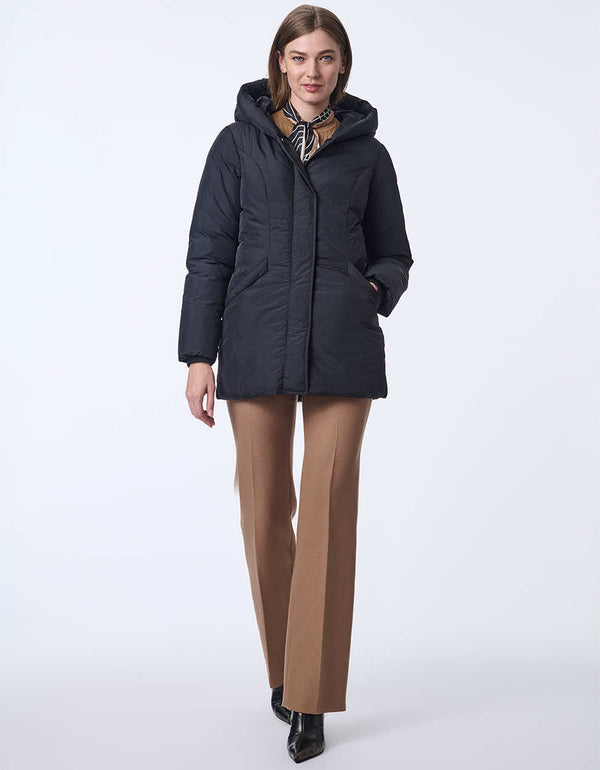 womens lightweight puffer coat with oversized hood. Made with recycled materials, this style keeps you cozy and fashionable.