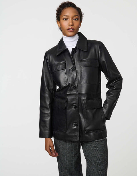 Long lamb leather shirt jacket with patch pockets and button front, blending utility with polish.