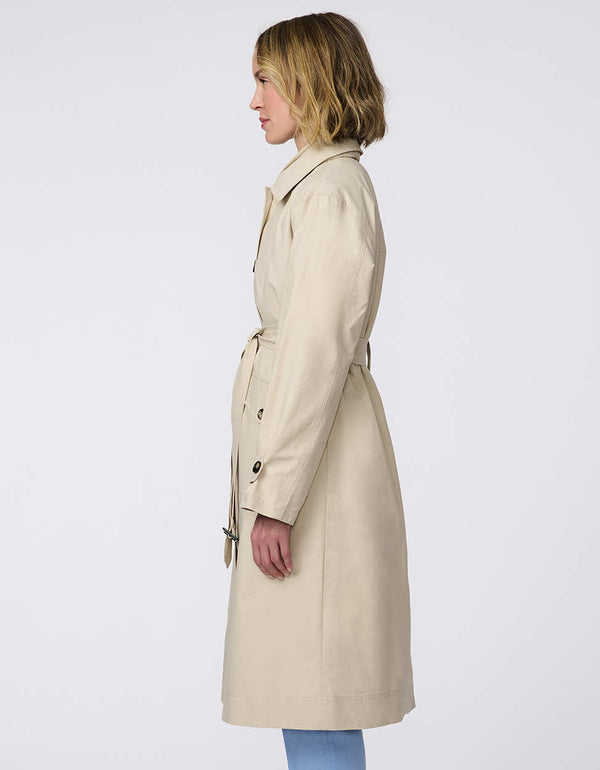 Modern trench coat with belted silhouette, contrast button details, removable quilted vest liner, and storm flap accents for versatile, seasonal styling