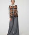 Women's Danner Plaid Vest with sherpa lining and oversized patch pockets in a plaid pattern.