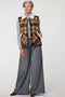 Women's Danner Plaid Vest with sherpa lining and oversized patch pockets in a plaid pattern.