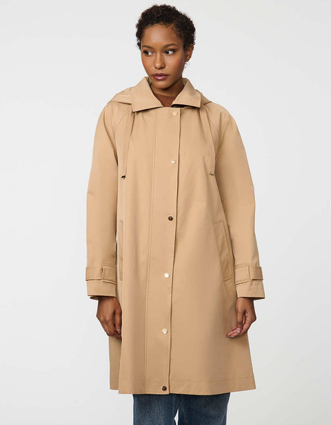 Oversized water-repellent trench coat with snap-off hood and button-flap zip closure, ideal for transitional layering.