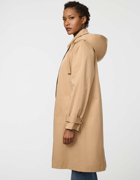 Oversized water-repellent trench coat with snap-off hood and button-flap zip closure, ideal for transitional layering.