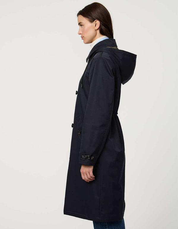 Women’s raincoat with hood, cinched waist, flap pockets, and zip-off hood in a tailored, versatile design.