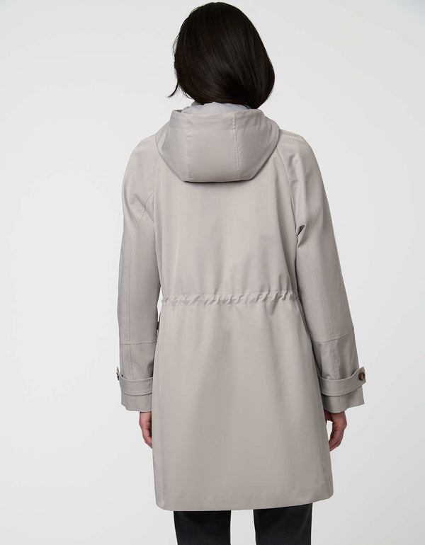 Elstead Raincoat for women featuring oversized patch pockets and adjustable waist for rainy days.