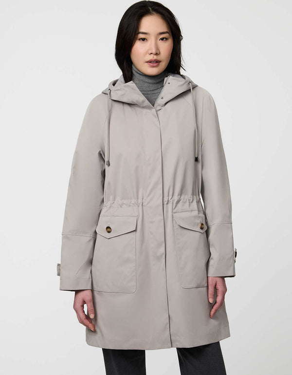 Elstead Raincoat for women featuring oversized patch pockets and adjustable waist for rainy days.