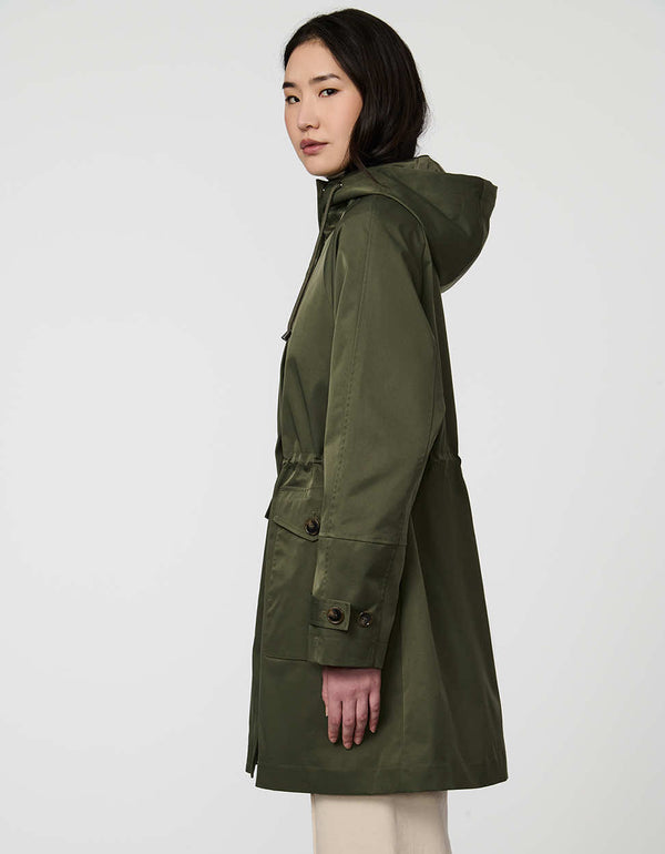 Elstead Raincoat for women featuring oversized patch pockets and adjustable waist for rainy days.